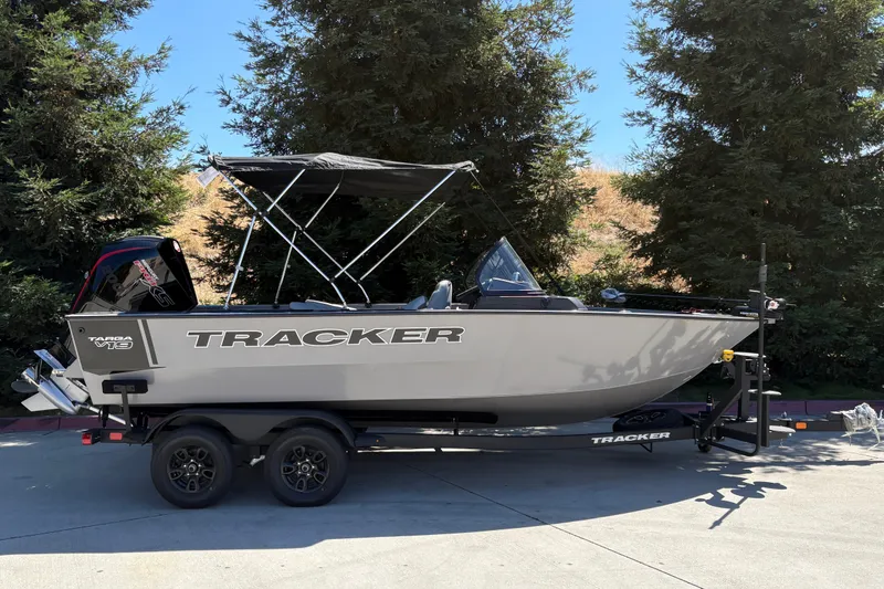The Image of 2027 Tracker Targa V-19 Combo boat on trailer, parked outdoors. - 0
