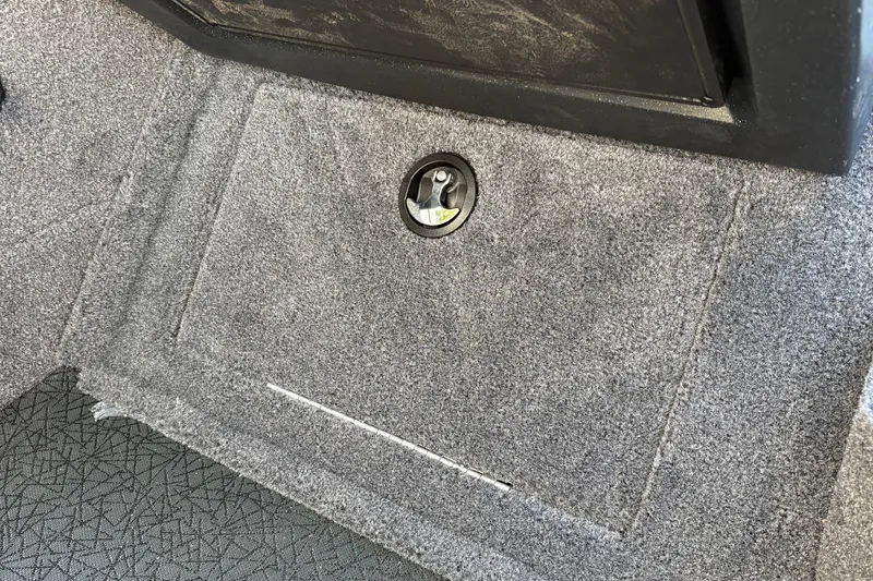 Slide: The Image of Carpeted storage compartment on 2027 Tracker Targa V-19 Combo boat. - 31