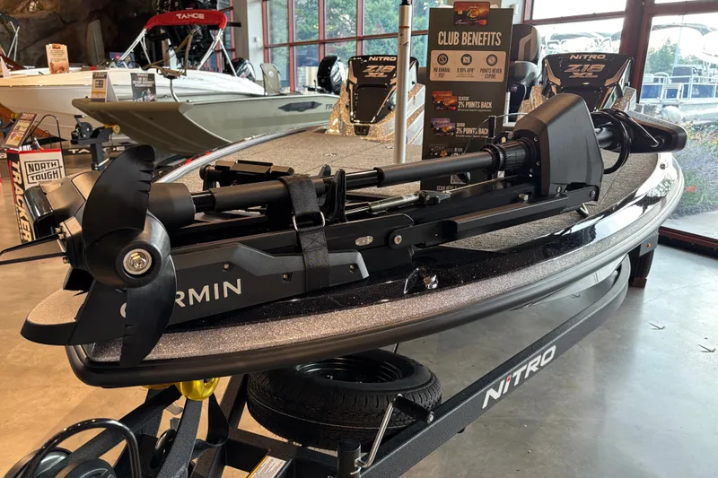 Slide: The Image of 2027 Nitro Z18 XL Pro boat with Garmin trolling motor in showroom display. - 1