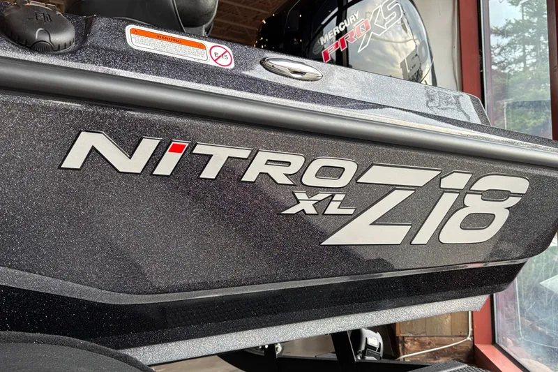 Slide: The Image of 2027 Nitro Z18 XL Pro boat with Mercury Pro XS engine, close-up view. - 5