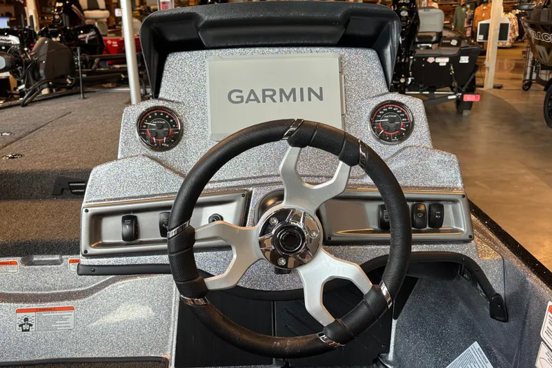 Slide: The Image of Steering console of 2027 Nitro Z18 XL Pro boat with Garmin display and gauges. - 2