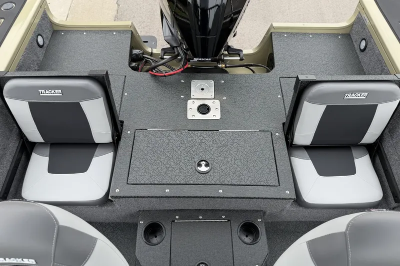Slide: The Image of Interior of 2027 Tracker Targa V-19 Combo boat with seating and storage compartments. - 21