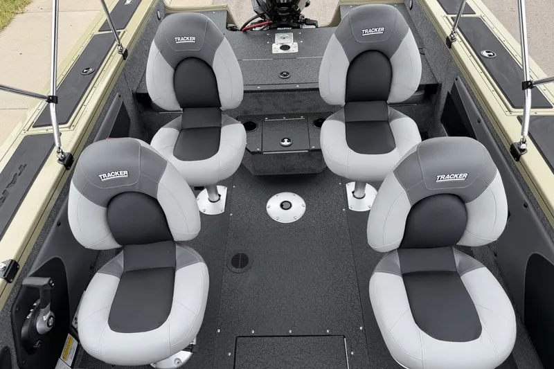 Slide: The Image of 2027 Tracker Targa V-19 Combo boat interior with four cushioned seats. - 14