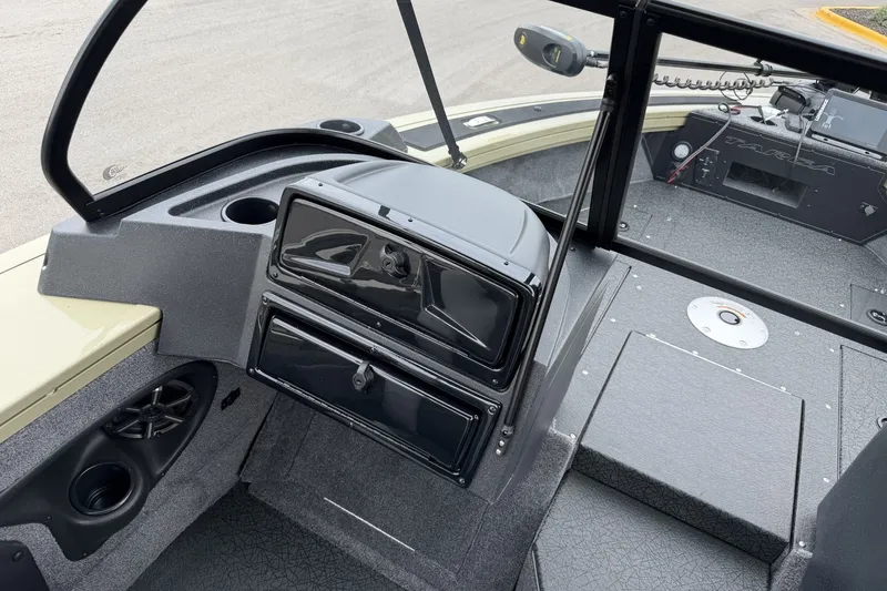 Slide: The Image of Interior view of a 2027 Tracker Targa V-19 Combo boat, showcasing dashboard and seating area. - 18