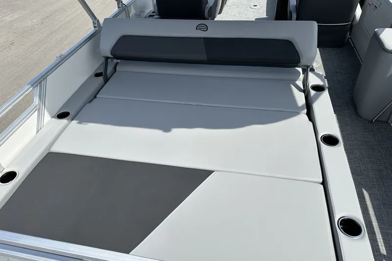 Slide: The Image of 2027 Sun Tracker Party Barge 22 RF DLX with spacious seating and cup holders. - 22