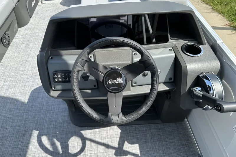 Slide: The Image of Steering console of 2027 Sun Tracker Party Barge 22 RF DLX pontoon boat. - 17