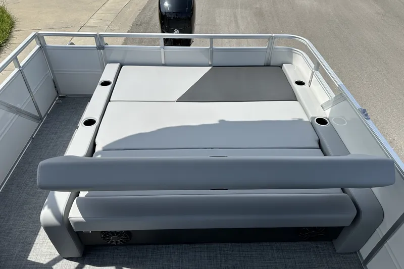 Slide: The Image of 2027 Sun Tracker Party Barge 22 RF DLX with spacious seating and cup holders. - 19
