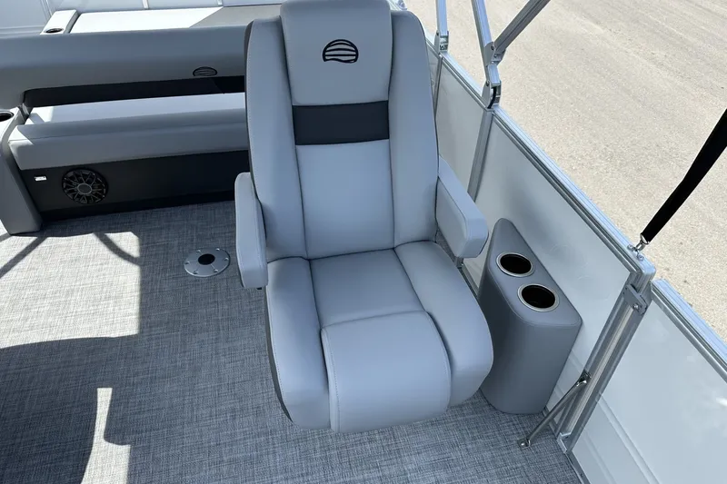Slide: The Image of 2027 Sun Tracker Party Barge 22 RF DLX boat seat with cup holders and speaker. - 15
