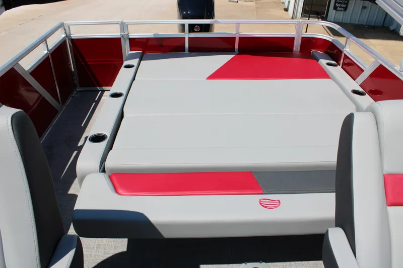 Slide: The Image of 2027 Sun Tracker Party Barge 22 RF DLX with red and gray seating area. - 20