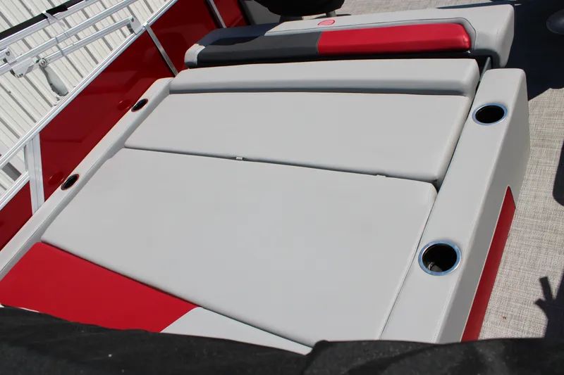 Slide: The Image of 2027 Sun Tracker Party Barge 22 RF DLX with red and gray seating area. - 21