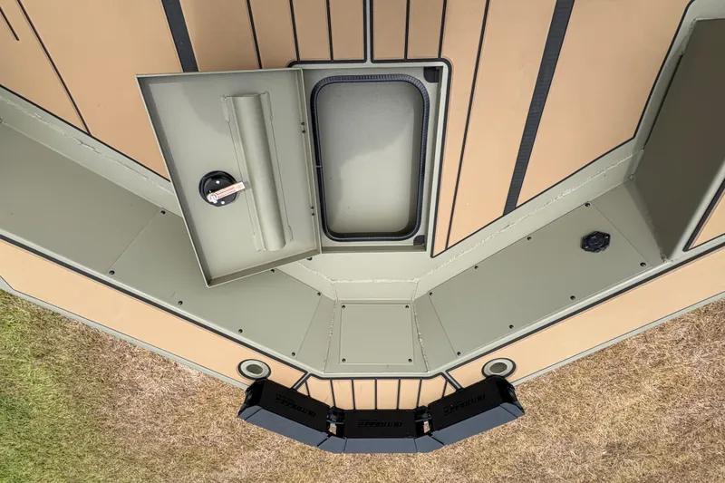 Slide: The Image of 2027 Tracker Grizzly 1756 T Marsh boat interior with storage compartments and seating. - 15
