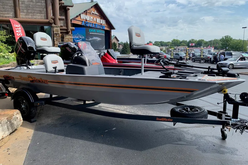 The Image of 2027 Tracker Bass Tracker Classic Limited boat on display outside an aquarium. - 0