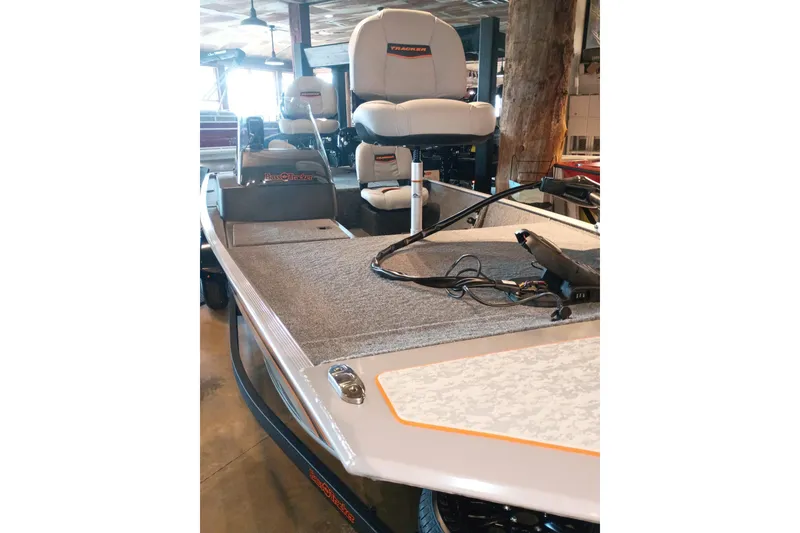 The Image of 2027 Tracker Bass Tracker Classic Limited boat interior with seating and fishing equipment. - 0