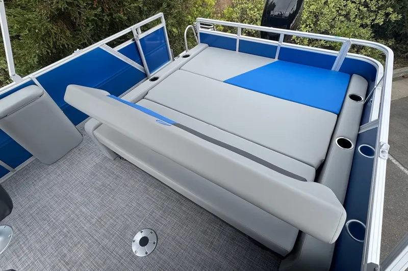 Slide: The Image of 2027 Sun Tracker Party Barge 22 RF DLX with spacious seating and cup holders. - 12