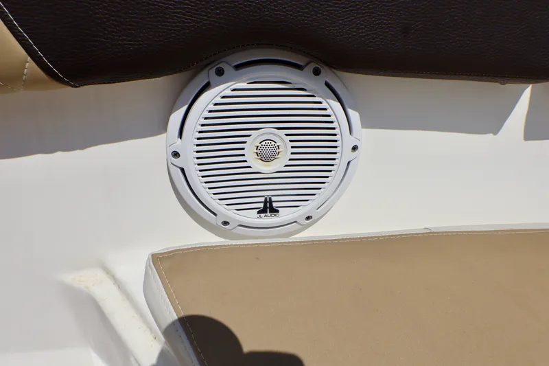 Slide: The Image of Speaker on 2023 Edgewater 262CX Crossover boat, featuring JL Audio system. - 44