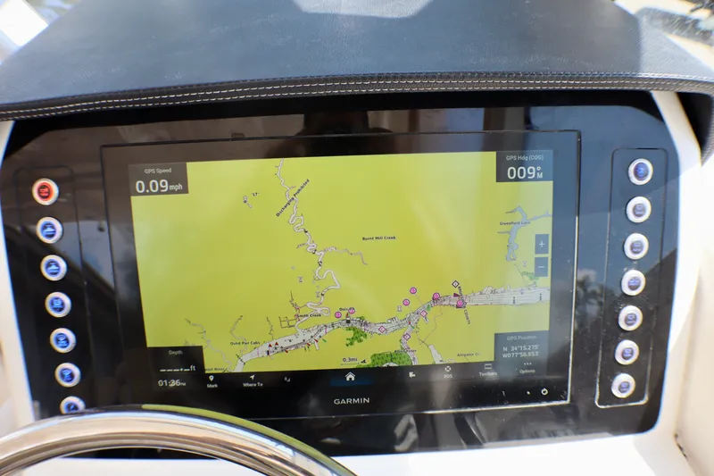 Slide: The Image of Garmin navigation display on 2023 Edgewater 262CX Crossover boat dashboard. - 30
