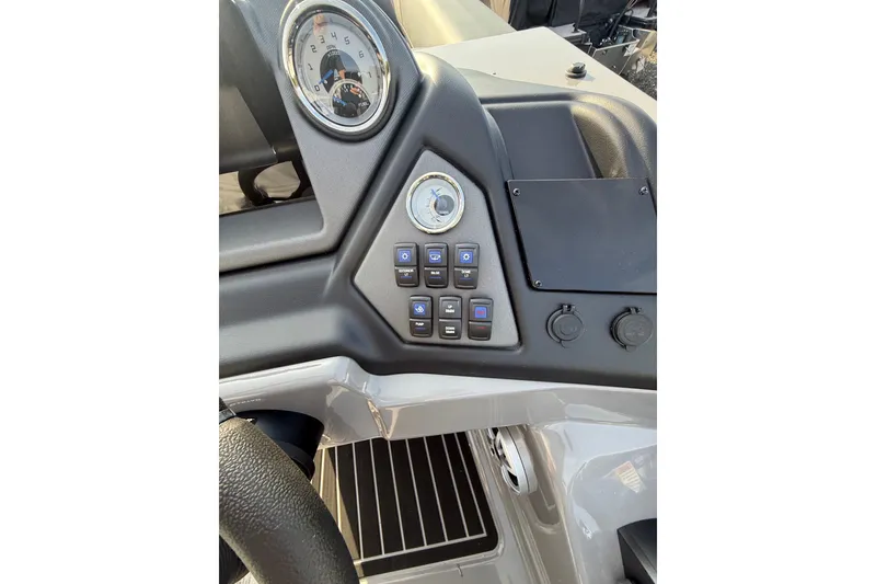 Slide: The Image of Dashboard of 2026 Sylvan L3 ULZ DH boat with gauges and control buttons. - 16
