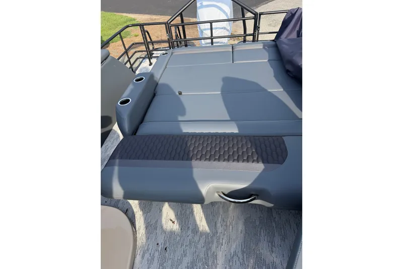 Slide: The Image of Luxurious seating on 2026 Sylvan L3 ULZ DH boat with cup holders and textured upholstery. - 23