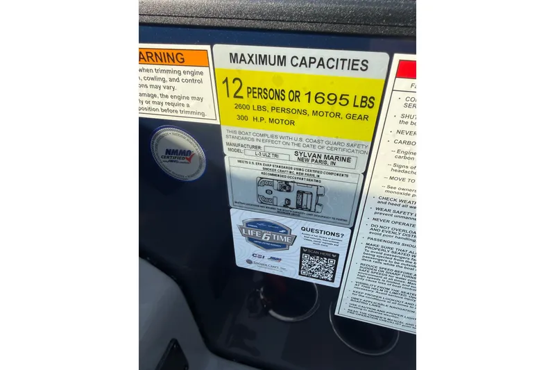 Slide: The Image of Capacity label for Sylvan L3 ULZ DH 2026 boat, max 12 persons or 1695 lbs. - 28