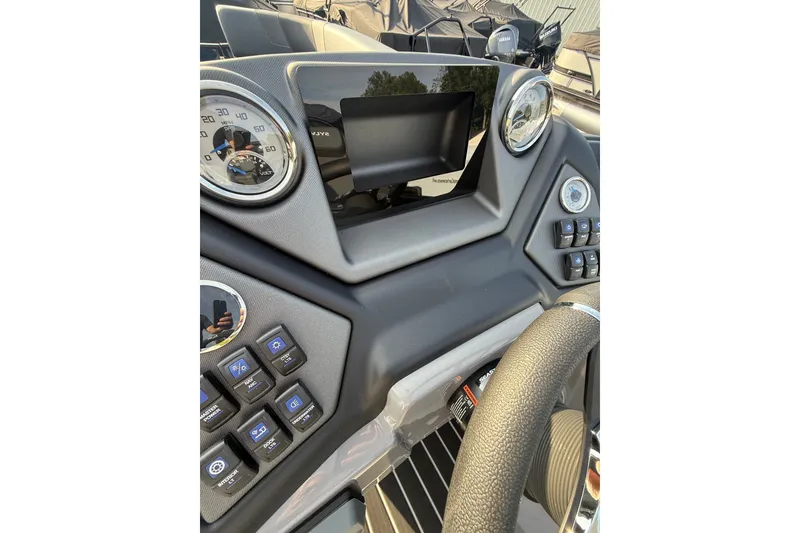 Slide: The Image of Dashboard of 2026 Sylvan L3 ULZ DH boat with modern controls and gauges. - 15