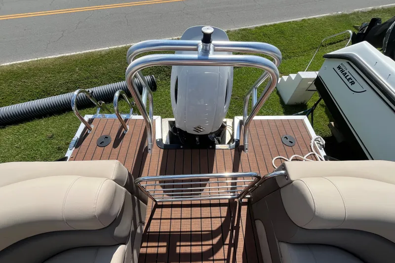 Slide: The Image of 2023 Bentley Pontoons 220 Elite Admiral deck with seating and railing, viewed from above. - 7