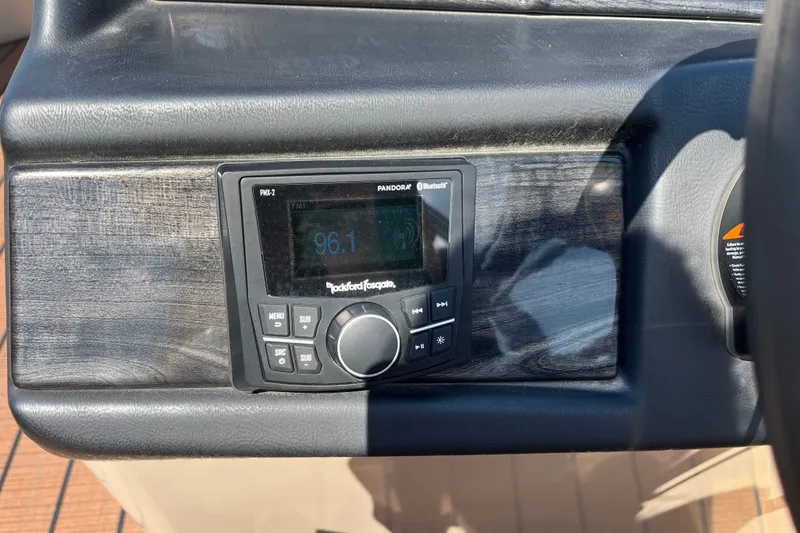 Slide: The Image of 2023 Bentley Pontoons 220 Elite Admiral dashboard with Rockford Fosgate stereo system. - 14