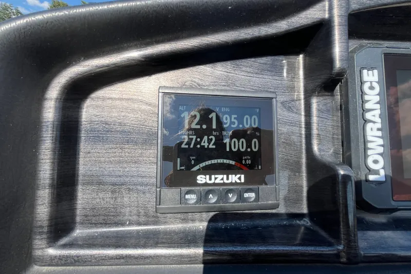 Slide: The Image of Dashboard of 2023 Bentley Pontoons 220 Elite Admiral with Suzuki display and Lowrance device. - 13