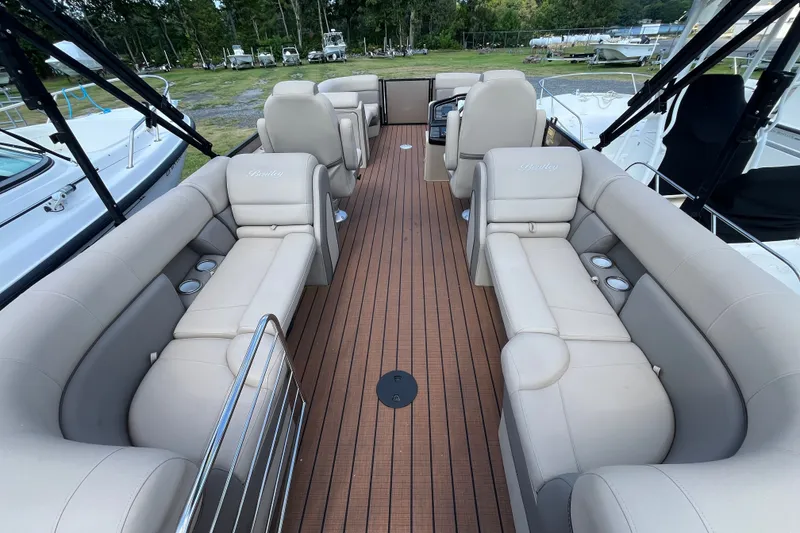 Slide: The Image of 2023 Bentley Pontoons 220 Elite Admiral with luxurious seating and spacious deck. - 3