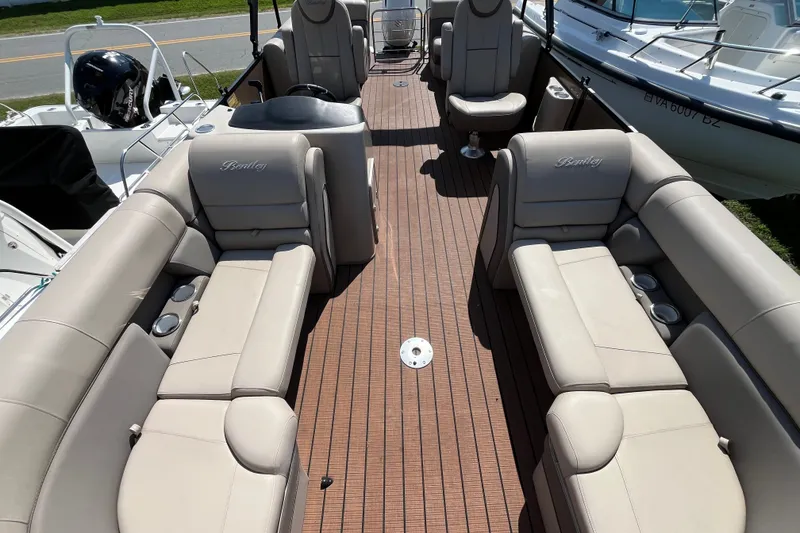 Slide: The Image of 2023 Bentley Pontoons 220 Elite Admiral with luxurious seating and sleek design. - 9