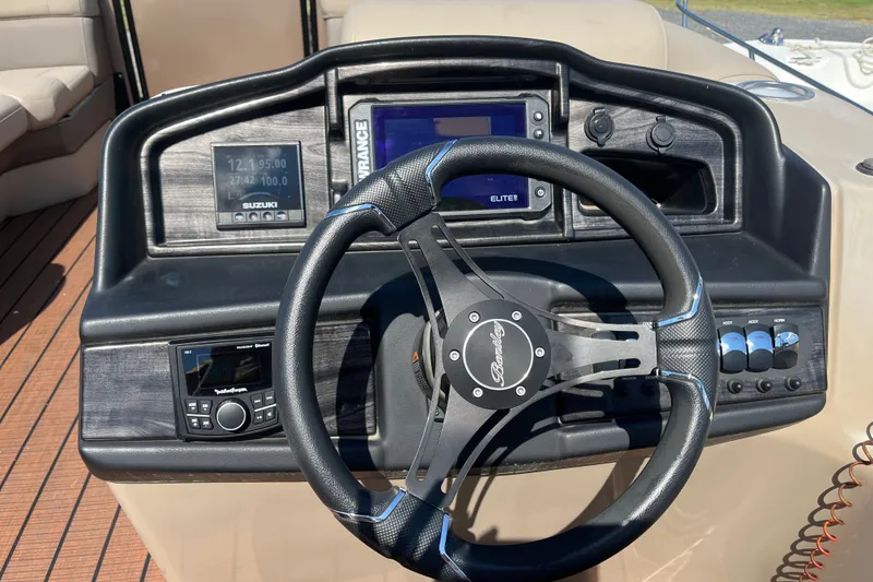 Slide: The Image of Steering console of 2023 Bentley Pontoons 220 Elite Admiral with modern controls and displays. - 4