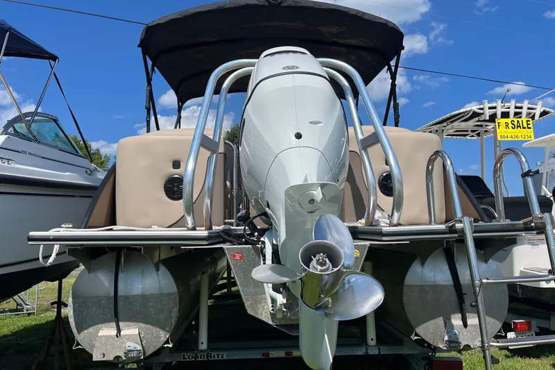 Slide: The Image of 2023 Bentley Pontoons 220 Elite Admiral with outboard motor, for sale sign visible. - 17