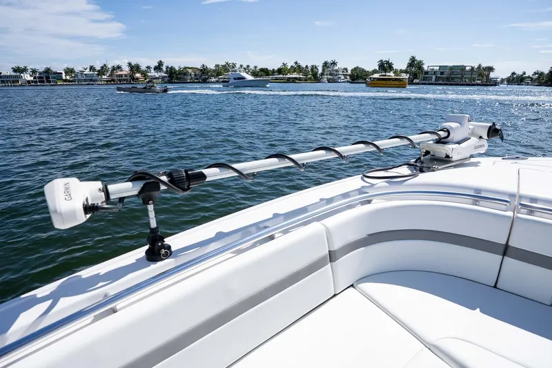 Slide: The Image of 2021 Intrepid 327 Nomad boat with Garmin equipment on a sunny day. - 33