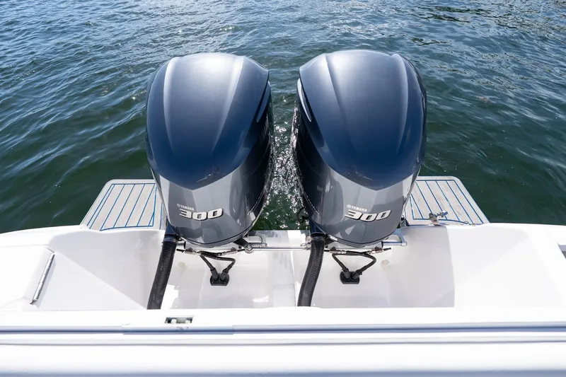 Slide: The Image of Twin Yamaha 300 outboard engines on a 2021 Intrepid 327 Nomad boat. - 42