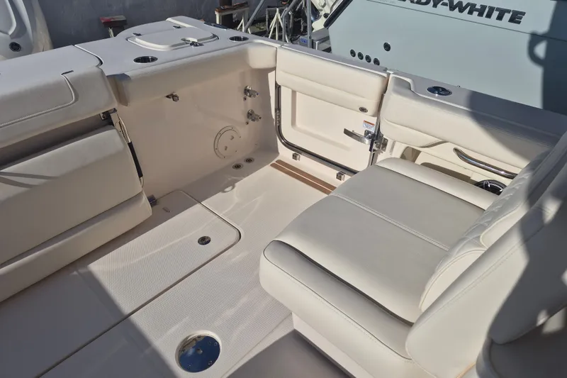 Slide: The Image of Interior of 2027 Grady-White Freedom 307 boat, featuring luxurious seating and sleek design. - 20