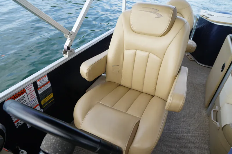 Slide: The Image of Luxurious beige captain's chair on 2018 Bennington 22 SSX pontoon boat. - 21