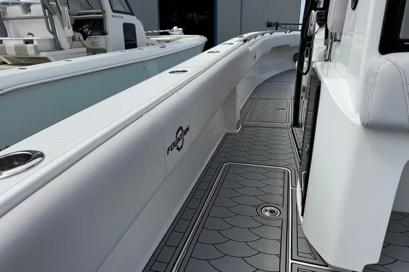 Slide: The Image of 2024 Fountain 34 Tournament Edition boat interior with sleek design and modern features. - 24