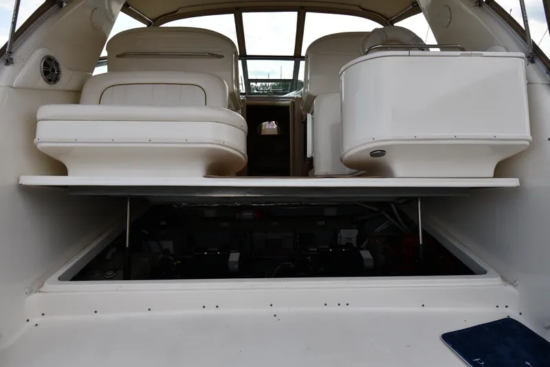 Slide: The Image of 2000 Sea Ray 330 Express Cruiser interior with open engine compartment. - 34