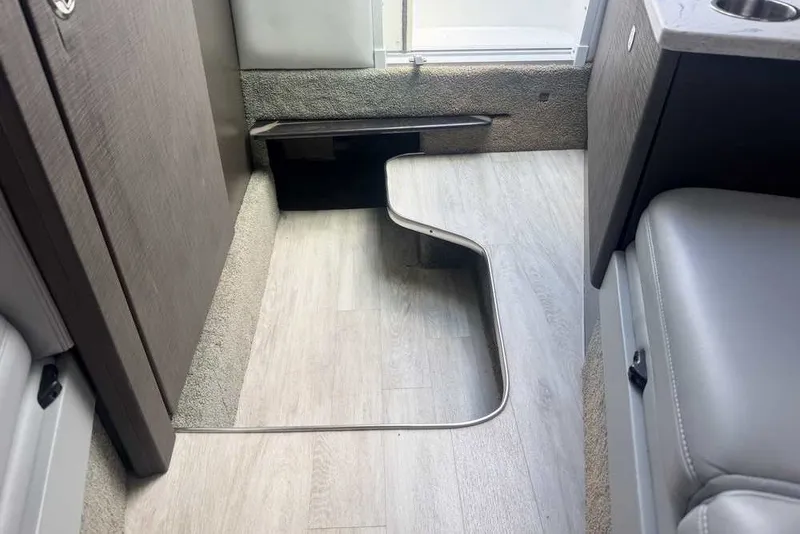 Slide: The Image of Interior of 2018 Formula 290 Sun Sport boat with modern flooring and seating. - 42