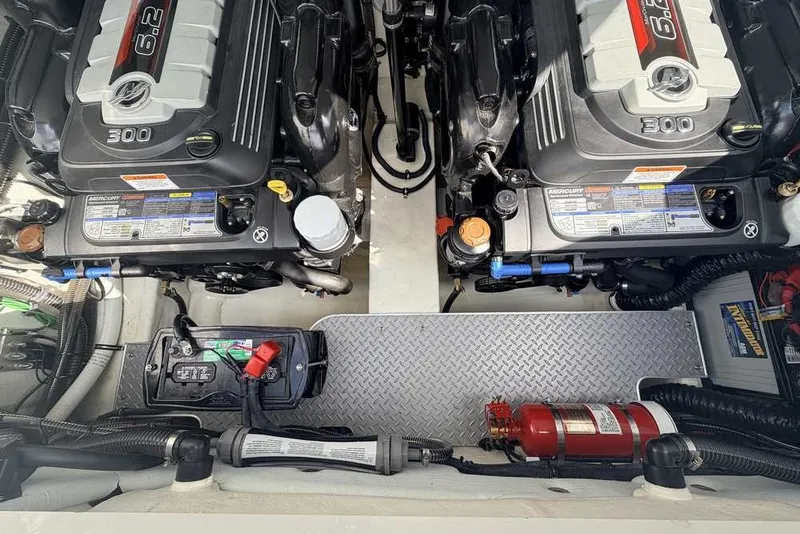 Slide: The Image of Engine compartment of a 2018 Formula 290 Sun Sport boat with dual 6.2L engines. - 49