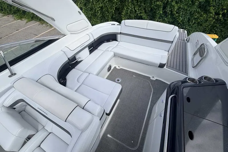 Slide: The Image of 2018 Formula 290 Sun Sport boat interior with sleek white seating and modern design. - 15