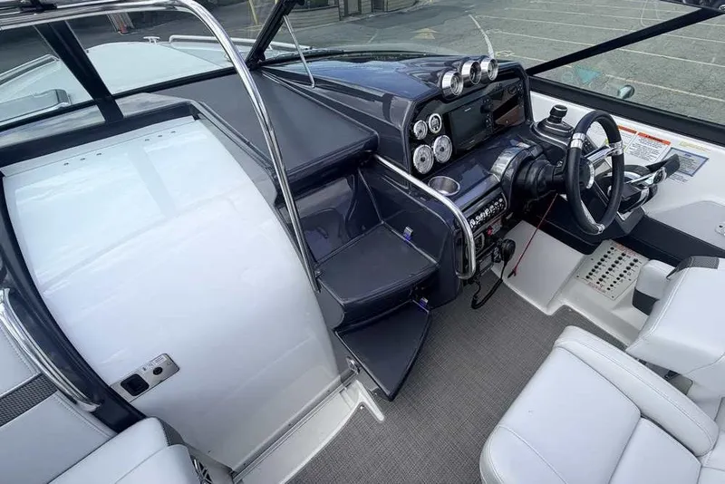 Slide: The Image of 2018 Formula 290 Sun Sport boat interior with sleek dashboard and modern controls. - 36