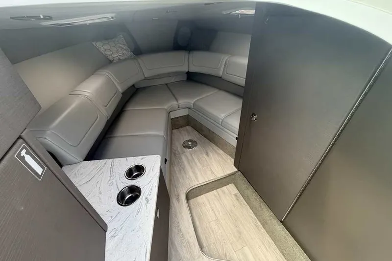 Slide: The Image of 2018 Formula 290 Sun Sport cabin with gray seating and modern interior design. - 37