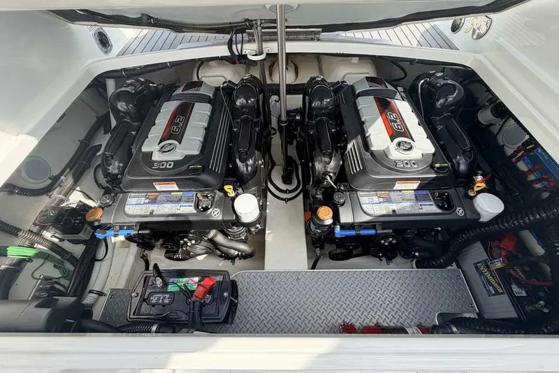 Slide: The Image of Twin engines in a 2018 Formula 290 Sun Sport boat, showcasing powerful performance. - 46