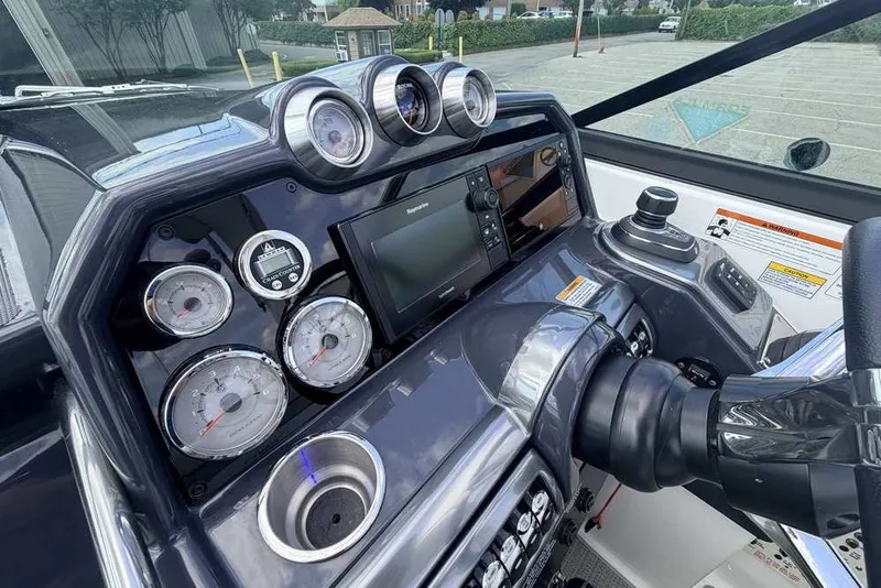 Slide: The Image of Dashboard of a 2018 Formula 290 Sun Sport boat with gauges and controls. - 31