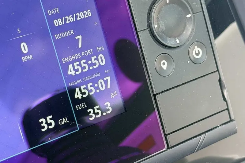Slide: The Image of Display screen of a 2018 Formula 290 Sun Sport showing engine hours and fuel levels. - 32