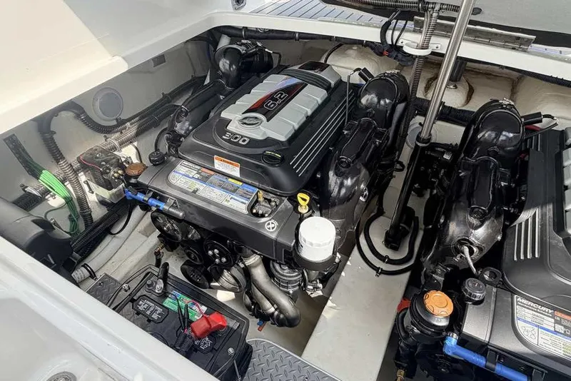 Slide: The Image of Engine compartment of a 2018 Formula 290 Sun Sport boat, showcasing a powerful 6.2L engine. - 48