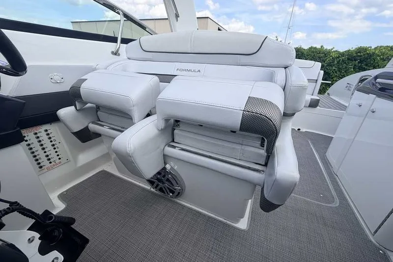 Slide: The Image of 2018 Formula 290 Sun Sport boat interior with plush seating and modern design. - 30