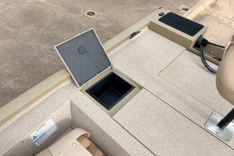 Slide: The Image of 2021 G3 Sportsman 1610 boat interior with open storage compartment. - 30