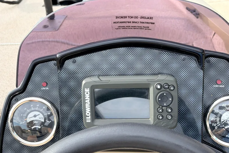 Slide: The Image of Dashboard of 2021 G3 Sportsman 1610 boat with Lowrance fishfinder and gauges. - 25