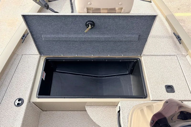 Slide: The Image of 2021 G3 Sportsman 1610 boat with open storage compartment. - 17